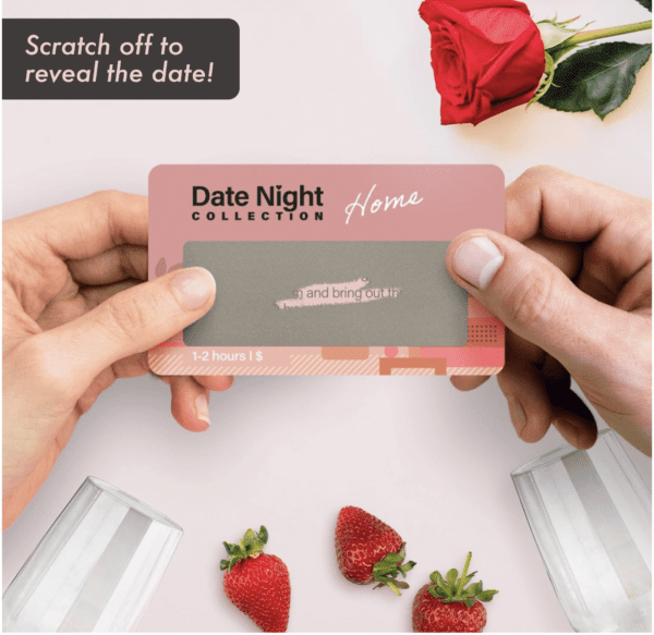 A couple holding up a date night collection card.